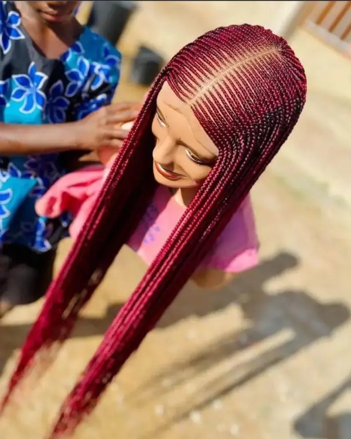 Original marketplace photo of a long burgundy braided wig