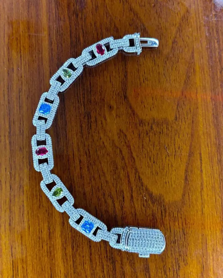 Original marketplace photo of a silver bracelet with colourful gemstones