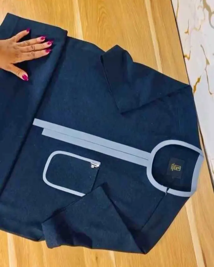 Original marketplace photo of a navy kaftan with pale blue trim