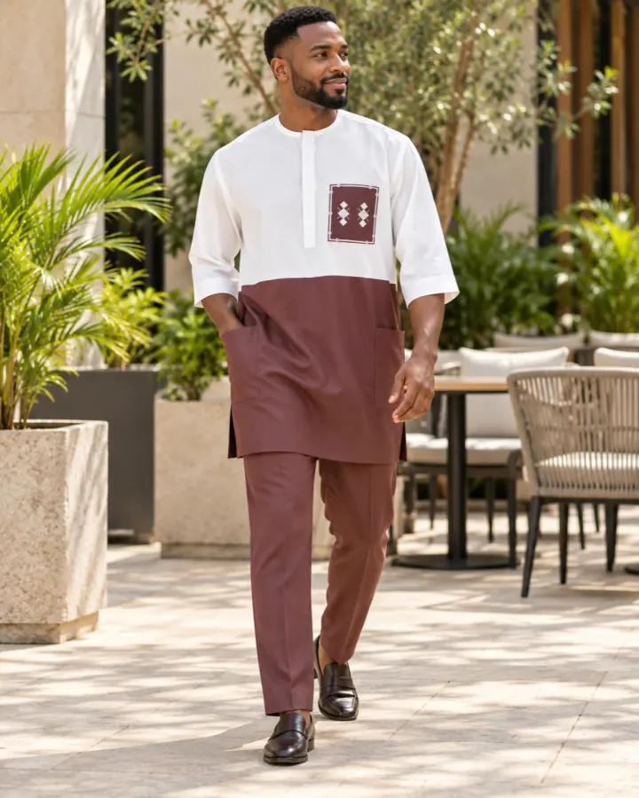Model wearing the white and burgundy traditional two-piece set outdoors